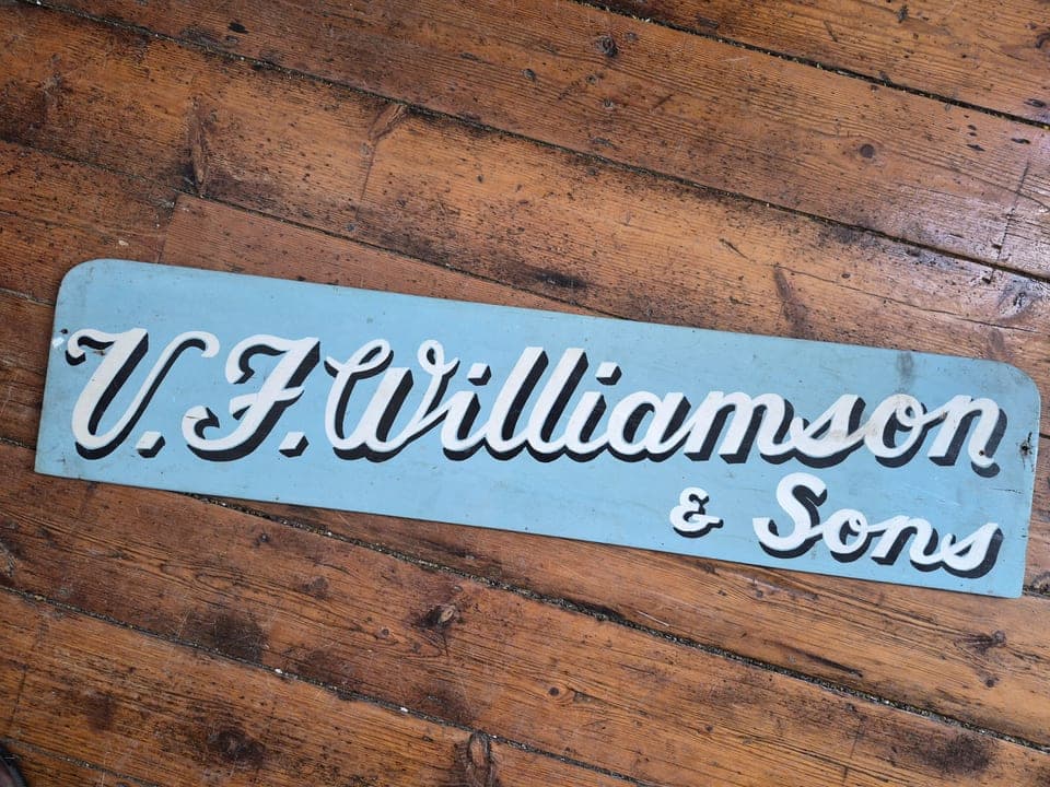 Signwriter's script, pale blue and cream